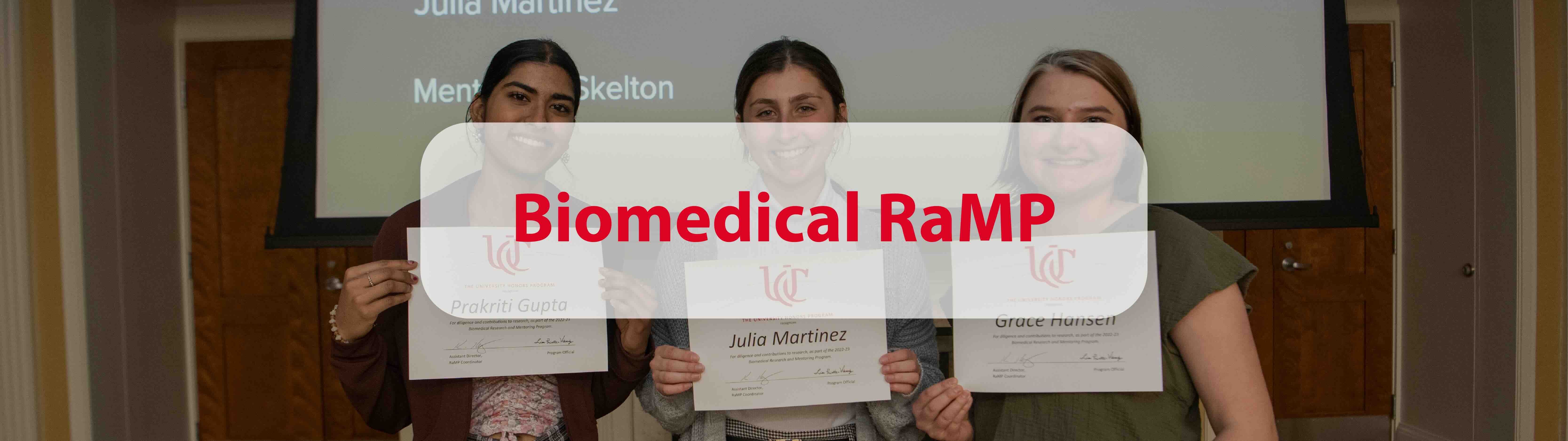 Biomedical Ramp Icon with three students holding certificates.