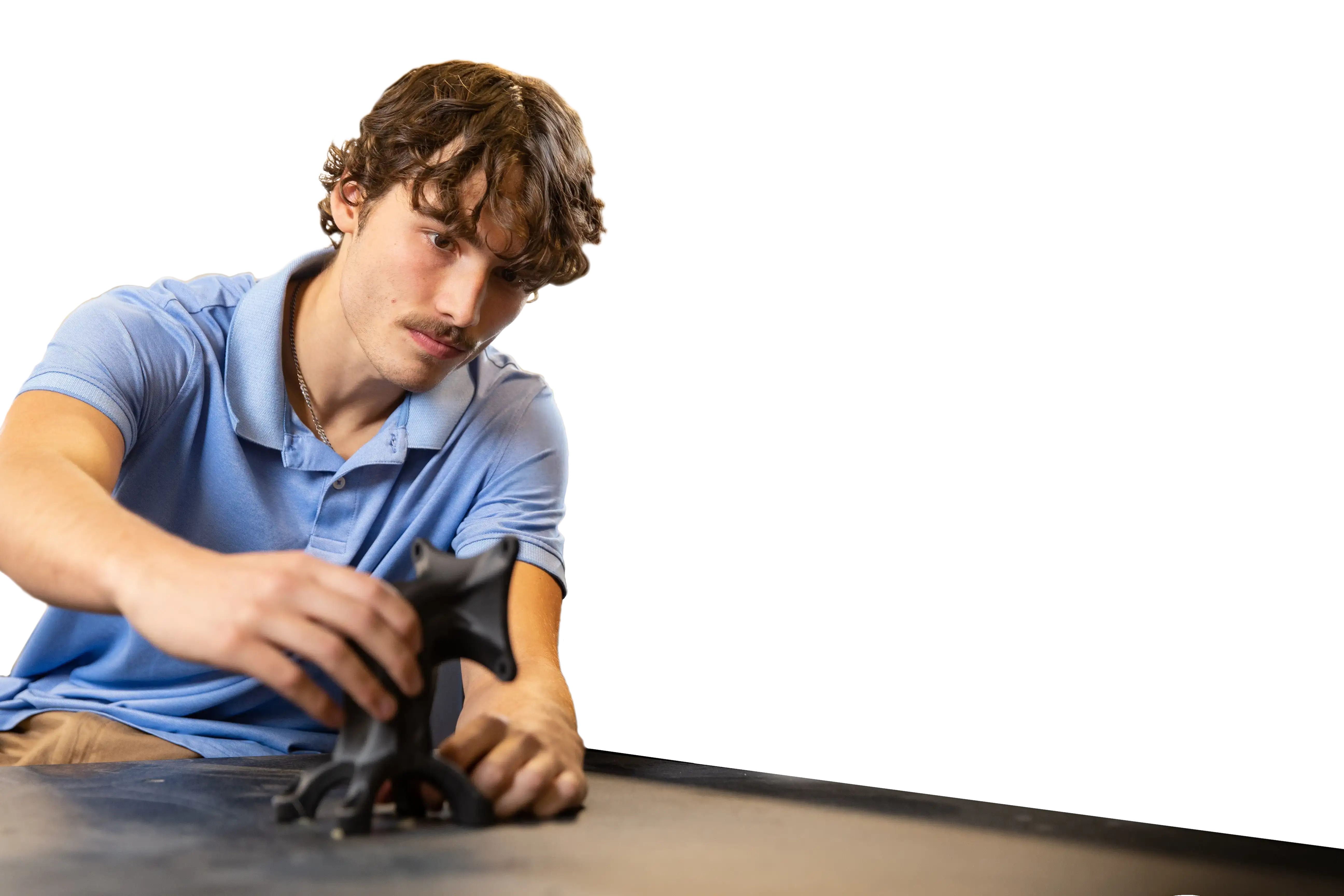 A University of Cincinnati co-op student works at Kinetic Vision