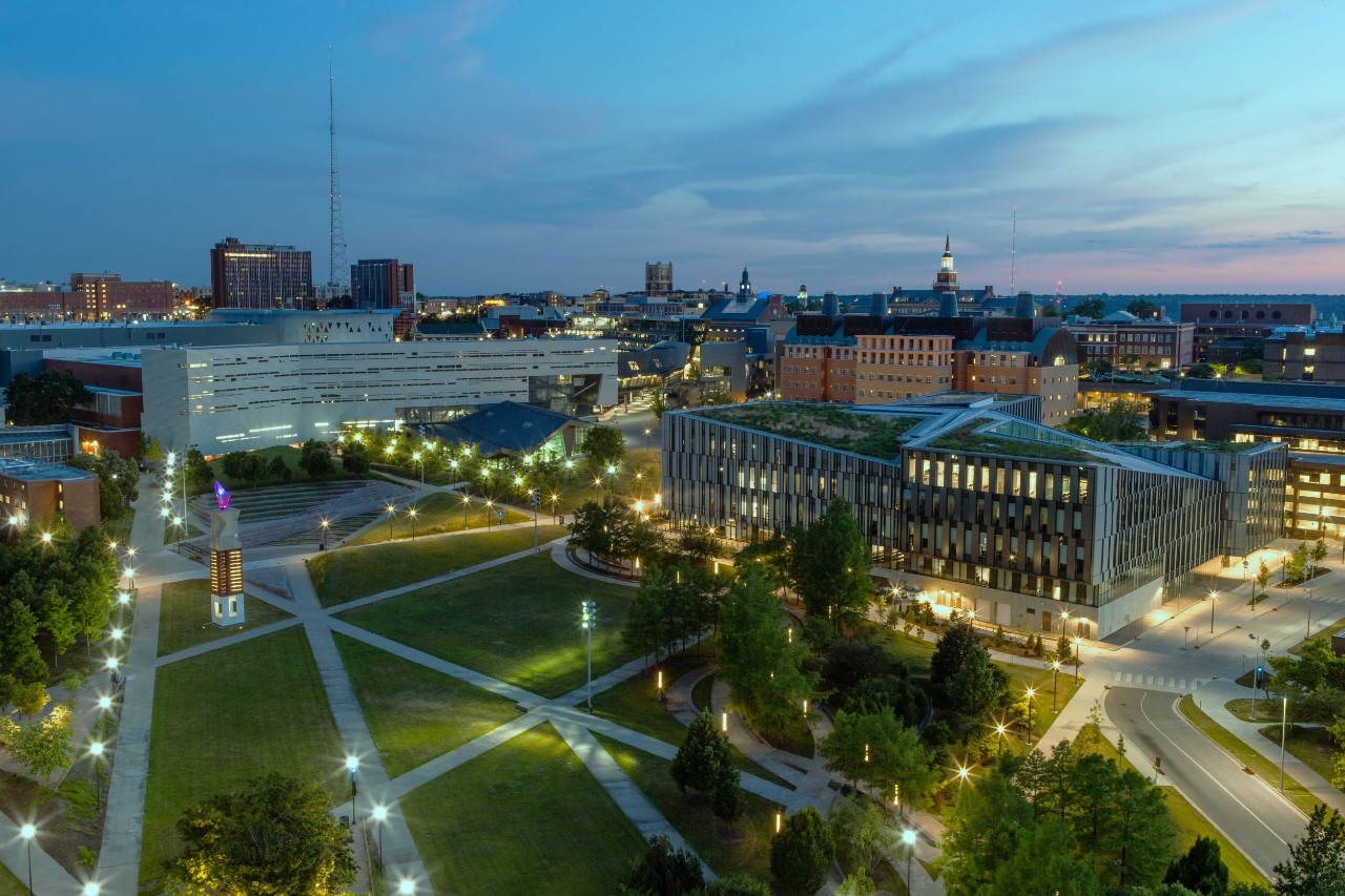 aerial view of UC's campus at night 