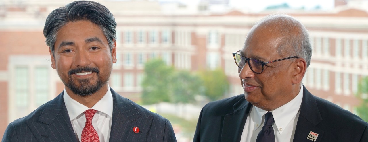 Cincinnati Mayor Aftab Pureval next to UC President Neville Pinto
