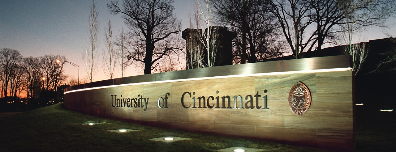 University of Cincinnati sign near the Martin Luther King Avenue entrance at Uptown West campus.